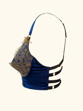 Load image into Gallery viewer, A side product image of the Anna 1/4 cup bra. The tops of the cups where they meet the straps are decorated with tiny golden bows. The silk shoulder straps reach over the shoulder and then attach to an adjustable black elastic strap with a gold ring.