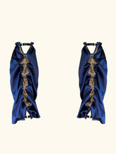 Load image into Gallery viewer, A product image of the front of the sleeves. The sleeves are gathered down the inner arm seam creating an attravtive drape. The have straps at the wrist and top of arm that fasten with gold g hooks.
