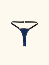 Load image into Gallery viewer, A back product image of the Anna thong. The back is blue stretch silk edged in black picot elastic. The straps are black. The waist strap features a gold ring detail in the centre of the strap. All straps are adjustable.