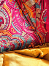 Load image into Gallery viewer, Red silk with orange and turqouise embroidery. Yellow silk binding shown next to it.