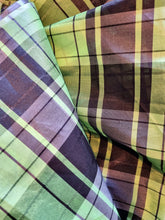 Load image into Gallery viewer, Grass green and black checked fabric.