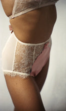 Load image into Gallery viewer, The ouvert knickers from the side front. The front is lace and silk with a ribbon rosette decoration. The back is pale pink mesh. There are small frills of lace at the top of the legs.