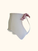 Load image into Gallery viewer, The Sarah ouvert knickers on a stand. This shows the overlapping back panels and the pink bow at the back of the waist.