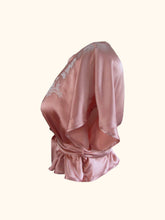 Load image into Gallery viewer, The side of the Sarah lounge top shows the sleeves falling in folds from the shoulder and their generous cut.
