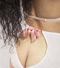 Load image into Gallery viewer, The back of the Sarah ouvert knickers. There is a pink silk waist bow attached to the knicker backs with small gold rings. The two back panels overlap at the bottom and sweep round in an inverted teardrop shape exposing the top of the model's bottom.
