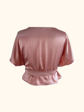 Load image into Gallery viewer, The back of the Sarah top with the waist tie, showing the back sitting flat and the wide neck.