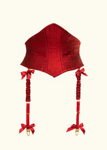 Load image into Gallery viewer, The front of the corset belt without the sash. The belt is around 4 inches deep at the sides and curves up to a point at the top and bottom centre front where it is 9 inches deep. The edges are bound in silk bias binding. Visible seams give shaping.