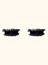 Load image into Gallery viewer, A pair of black garters. The central band is 1cm wide black satin elastic. The top and bottom of which is trimmed with pleated black tulle. The tulle is 2cm wide.