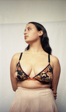 Load image into Gallery viewer, The Avocado bamboo tap pants shot from the front on a model who also wears the Josephine bralette. The dusky pink of the tap pants compliments the tones on the bralette. The model looks off to the side with her hands behind her back.