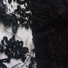 Load image into Gallery viewer, A shot of the heavier black corded lace and black silk satin used in the black option.