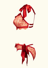 Load image into Gallery viewer, The Olenska lace bralette and knickers from the side. Both feature long silk satin bows as fastenings, the bralette at the shoulders and the knickers at the sides.