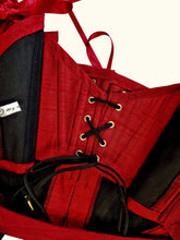 Load image into Gallery viewer, The lace up back option, hidden behind the wrap over at the back. The lacing is black with gold tipped ends. There are 5 eyelets on each side that the lacing threads through.