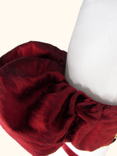 Load image into Gallery viewer, A close up on the gathers that provide the volume to the sleeve puffs.