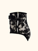 Load image into Gallery viewer, The side of the Sarah black knickers. Showing the 2 silk covered buttons and loops that fasten the side. The waistband is secured by a gold g hook.