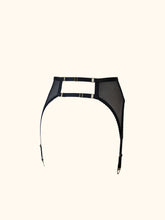 Load image into Gallery viewer, The back of the Win suspender belt. The back fastenes with 2 adjustable straps, both finished with gold hardware, the straps sit around 5cm above one another. All elastic are black.