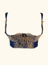 Load image into Gallery viewer, A front product image of the Amma 1/4 cup bralette. The cups are layered blue silk and gold lace, the edge of the lace is an eyelash pattern. The cup edges are decorated with small freshwater pearls.
