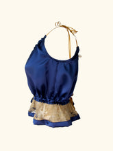 Load image into Gallery viewer, Side product photo of the blue silk camisole the shoulder ribbons are clearly visible and the bows drape either side of the shoulder.
