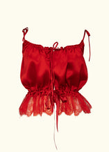 Load image into Gallery viewer, The front of the Olenska cami in red silk. The front is fastened at the neckline and the waist with ribbons. The silk is gathered onto this ribbon. The cami is open, with a small slit like opening, between these two ribbons from the neckline to the waist.
