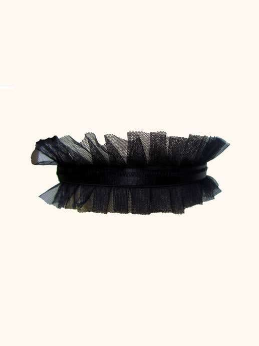 The front of a black choker with a central satin elastic band 1cm wide and a pleated tulle frill on either side. The tulle frills are around 2cm in width.