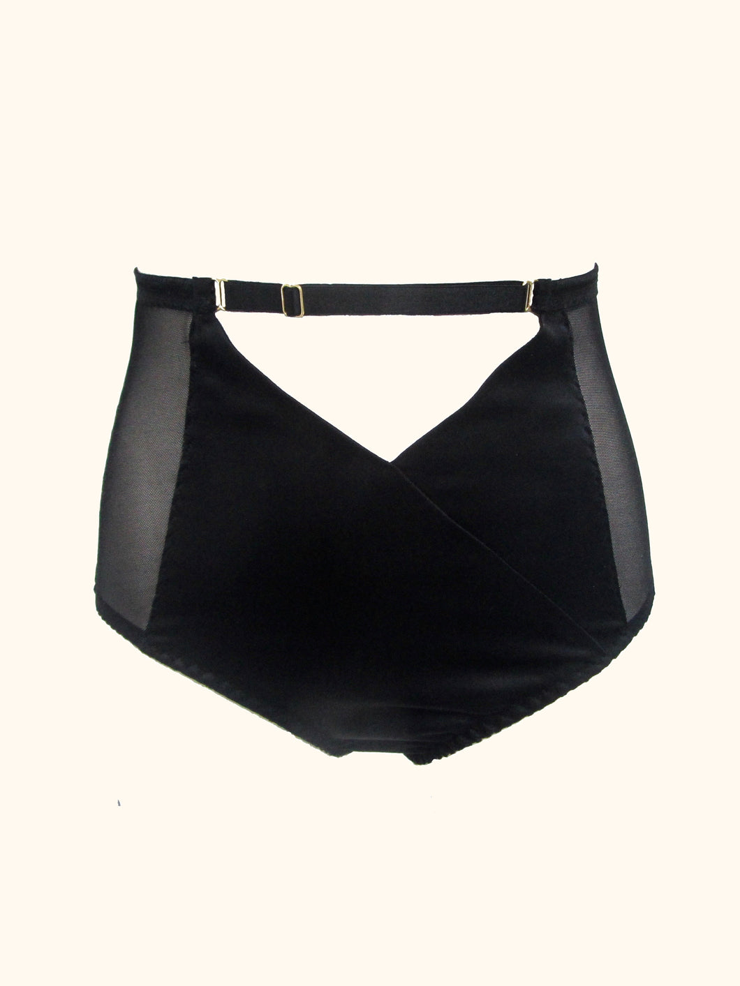 The black silk and mesh Serena knickers from the front. The front panel is silk with a cross over design. This creates an inverted triangle cut out at the front. The sides are sheer mesh.