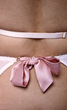Load image into Gallery viewer, The centre back pink silk bow that fastens the ouvert knickers. It is around 1 inch wide.
