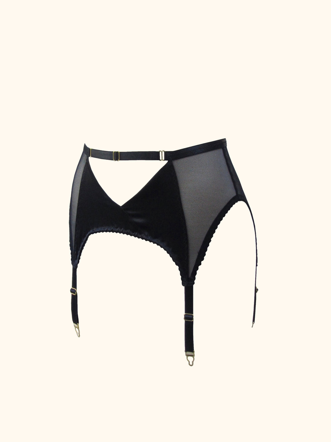 The front of the Win suspender belt. The belt has 4 straps and gold hardware. The front panels are silk and cross over to create an inverted triangle cut out below the waist. An adjustable waistband strap runs above this.