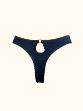 Cargar imagen en el visor de la galería, The back of the Artemis bamboo thong on a stand. Showing the keyhole detail at the centre back, the waistband links to a gold ring, and the keyhole extends below it. The keyhole is edged in black fold over elastic which matches the waistband.
