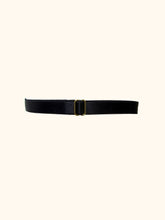 Cargar imagen en el visor de la galería, The back of a black garter. The back is formed of black satin elastic, around 1cm wide. The strapping is adjustable by way of a gold slider.
