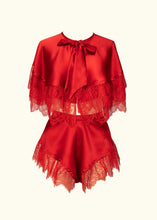 Load image into Gallery viewer, A front view of the Olenska tap pants and cape-let. Both use the same red silk and lace trim. This shows a styling option. The lace on the cape-let extends down to the waistband of the tap pants.
