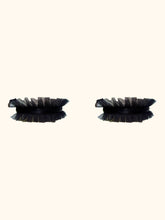 Cargar imagen en el visor de la galería, A pair of black garters. The central band is 1cm wide black satin elastic. The top and bottom of which is trimmed with pleated black tulle. The tulle is 2cm wide.
