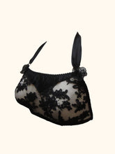 Charger l&#39;image dans la galerie, The Sarah bralette in black. The lace is heavier and corded, the rosettes at the neck are made from lace trim.
