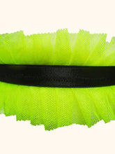 Cargar imagen en el visor de la galería, A close up of a choker with a central black satin elastic band. Either side of the band are neon yellow pleated tulle frills.
